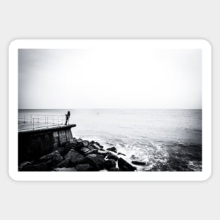 Solitary man at Cromer beach in Norfolk Sticker